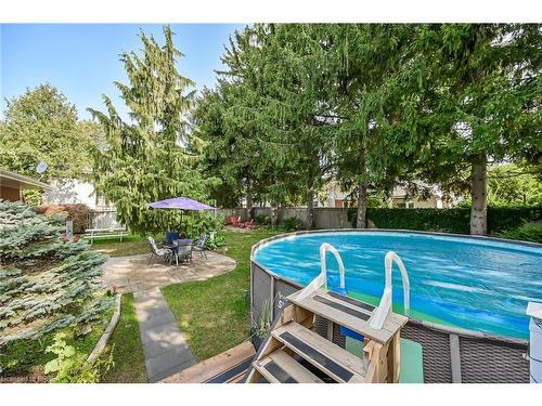 31 Harvest Lane, Brantford, ON - Outdoor With Above Ground Pool With Backyard