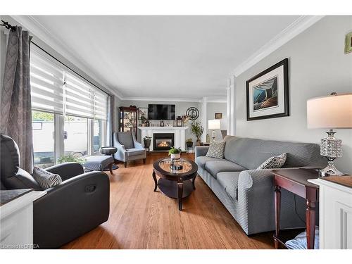 31 Harvest Lane, Brantford, ON - Indoor Photo Showing Living Room With Fireplace