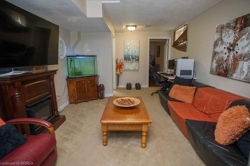 52 Beckett Drive, Brantford, ON - Indoor Photo Showing Living Room With Fireplace