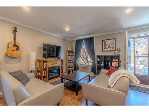 21 Wade Avenue, Brantford, ON - Indoor Photo Showing Living Room With Fireplace