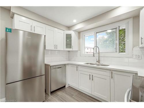 D-271 Stanley Street, Brantford, ON - Indoor Photo Showing Kitchen With Stainless Steel Kitchen With Double Sink