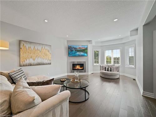 16-60 Dufferin Avenue, Brantford, ON - Indoor Photo Showing Living Room With Fireplace