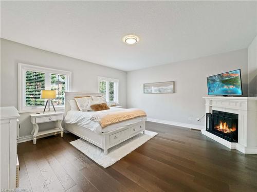 16-60 Dufferin Avenue, Brantford, ON - Indoor Photo Showing Bedroom With Fireplace