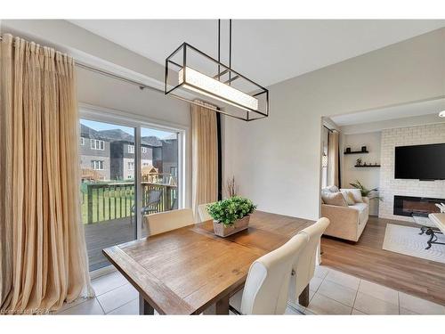 6 Tarrison Street, Brantford, ON - Indoor Photo Showing Dining Room With Fireplace