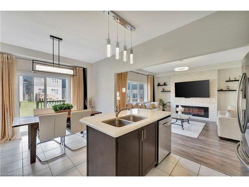 6 Tarrison Street, Brantford, ON - Indoor Photo Showing Kitchen With Fireplace With Double Sink