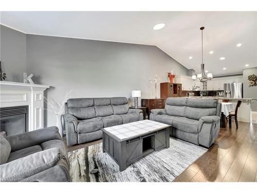 19-15 Cobden Court, Brantford, ON - Indoor Photo Showing Living Room With Fireplace