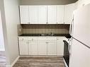 7-379 Darling Street, Brantford, ON  - Indoor Photo Showing Kitchen With Double Sink 