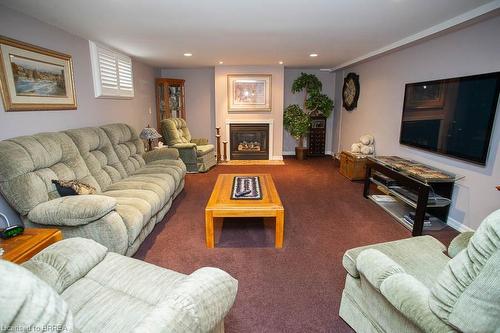 20 Allwood Street, Brantford, ON - Indoor Photo Showing Living Room With Fireplace