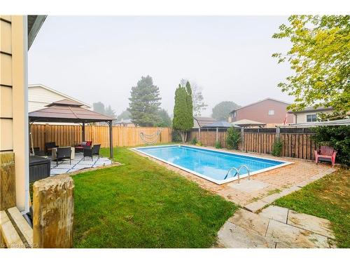 7 Fieldgate Drive, Brantford, ON - Outdoor With In Ground Pool With Backyard