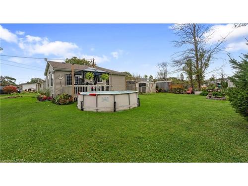 49 Wilcox Drive, Peacock Point, ON - Outdoor With Above Ground Pool With Backyard