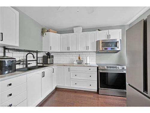 169 Connaught Avenue N, Hamilton, ON - Indoor Photo Showing Kitchen With Double Sink