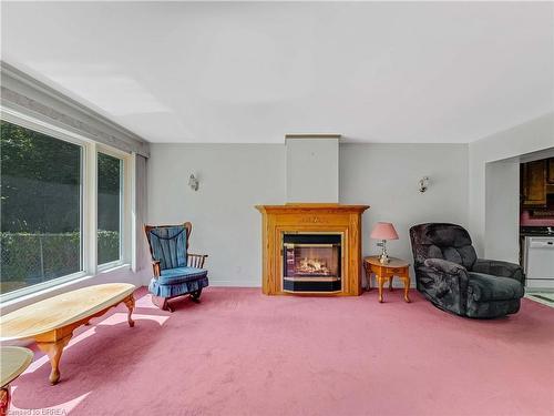 19 Church Street, Paris, ON - Indoor Photo Showing Living Room With Fireplace