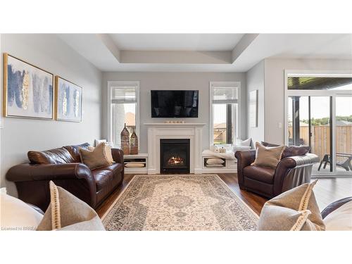 7 Coventry Court, Simcoe, ON - Indoor Photo Showing Living Room With Fireplace