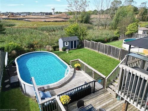 200 Mcguiness Drive, Brantford, ON - Outdoor With Above Ground Pool With Deck Patio Veranda With Backyard