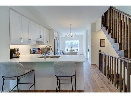 18-720 Grey Street, Brantford, ON - Indoor Photo Showing Kitchen With Double Sink