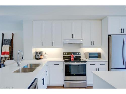 18-720 Grey Street, Brantford, ON - Indoor Photo Showing Kitchen With Double Sink