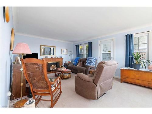 1 Grand River Avenue, Brantford, ON - Indoor Photo Showing Living Room With Fireplace