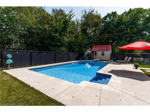 17 Trimdon Avenue, Brantford, ON - Outdoor With In Ground Pool With Deck Patio Veranda With Backyard