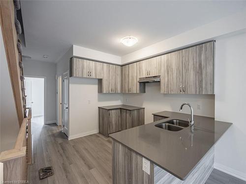 402-585 Colborne Street E, Brantford, ON - Indoor Photo Showing Kitchen With Double Sink