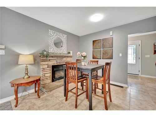 3 Brier Place, Brantford, ON - Indoor Photo Showing Dining Room With Fireplace