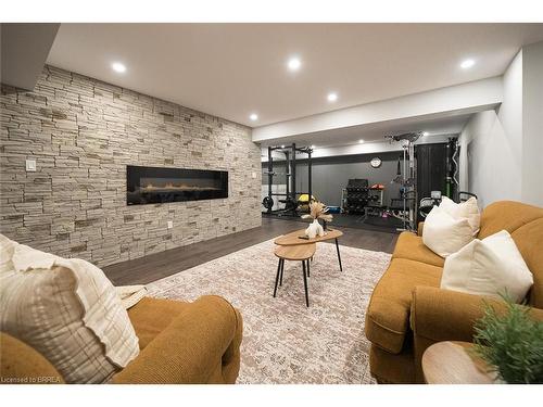 21 Tedley Boulevard, Brantford, ON - Indoor Photo Showing Living Room With Fireplace