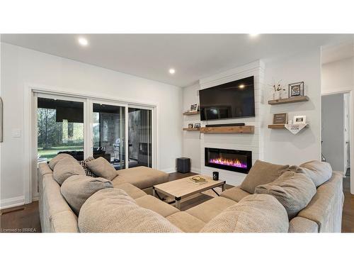 790 South Coast Drive, Peacock Point, ON - Indoor Photo Showing Living Room With Fireplace