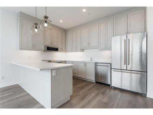 609-5 Hamilton Street N, Waterdown, ON - Indoor Photo Showing Kitchen With Stainless Steel Kitchen With Upgraded Kitchen