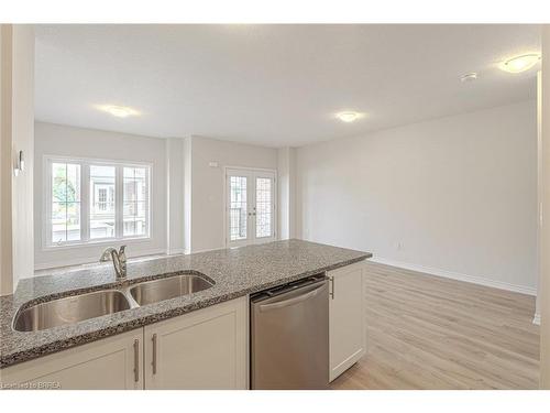 155-677 Park Road N, Brantford, ON - Indoor Photo Showing Kitchen With Double Sink