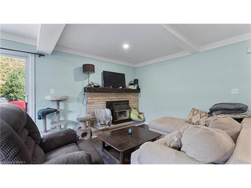 26 Westbrier Knoll, Brantford, ON - Indoor Photo Showing Living Room With Fireplace