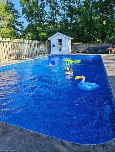 22 Walsh Court, Brantford, ON - Outdoor With In Ground Pool With Backyard