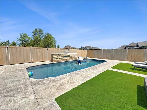 18 Harper Boulevard, Brantford, ON - Outdoor With In Ground Pool With Backyard