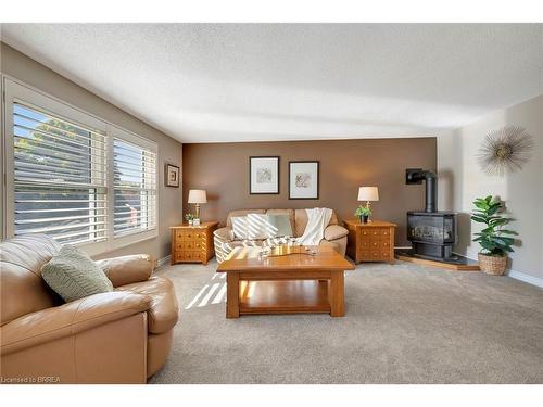 20 Farmington Place, Kitchener, ON - Indoor Photo Showing Living Room With Fireplace