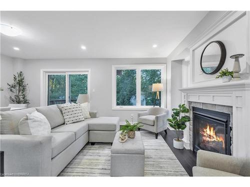 94 Sovereign Street W, Waterford, ON - Indoor Photo Showing Living Room With Fireplace