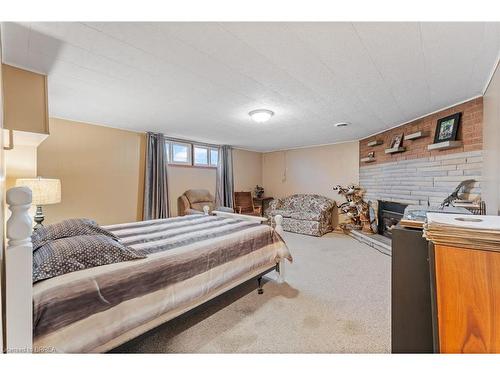 21 Janet Street, Port Colborne, ON - Indoor Photo Showing Bedroom With Fireplace