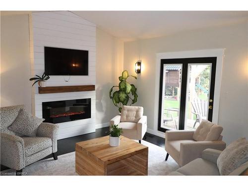 50019 John Wise Line, Aylmer, ON - Indoor Photo Showing Living Room With Fireplace