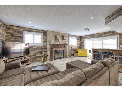 501 Sparkys Lane, Woodstock, ON - Indoor Photo Showing Living Room With Fireplace