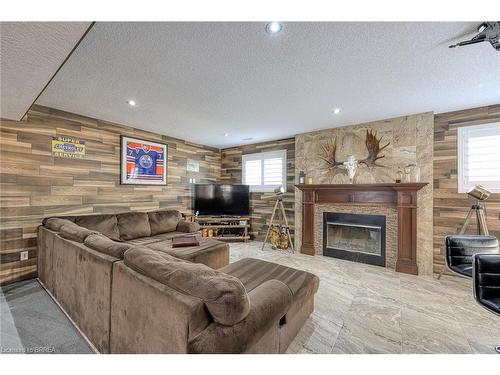 501 Sparkys Lane, Woodstock, ON - Indoor Photo Showing Living Room With Fireplace