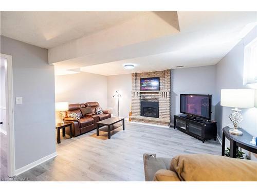 7 Fieldgate Drive, Brantford, ON - Indoor Photo Showing Living Room With Fireplace