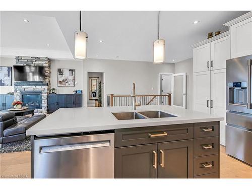 223 Oak Street, Simcoe, ON - Indoor Photo Showing Kitchen With Fireplace With Double Sink