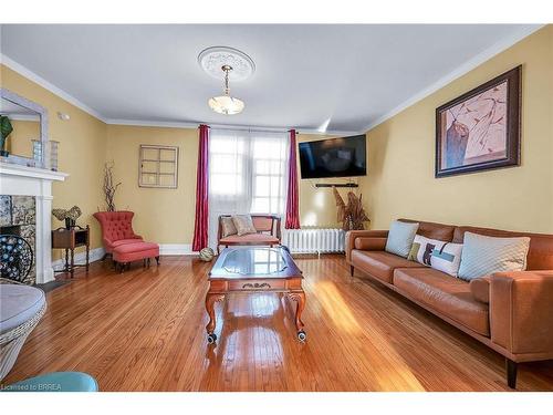 5-54 Dufferin Avenue, Brantford, ON - Indoor Photo Showing Living Room With Fireplace