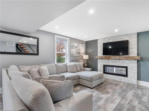 235 Oakland Road, Scotland, ON - Indoor Photo Showing Living Room With Fireplace