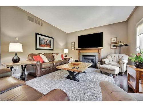 10 Golden Meadow Drive, Port Dover, ON - Indoor Photo Showing Living Room With Fireplace