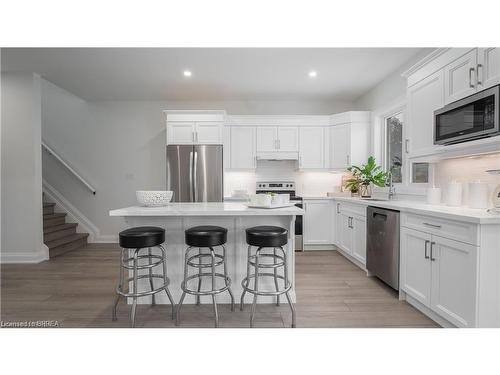 14 Peachleaf Lane, Waterford, ON - Indoor Photo Showing Kitchen With Upgraded Kitchen