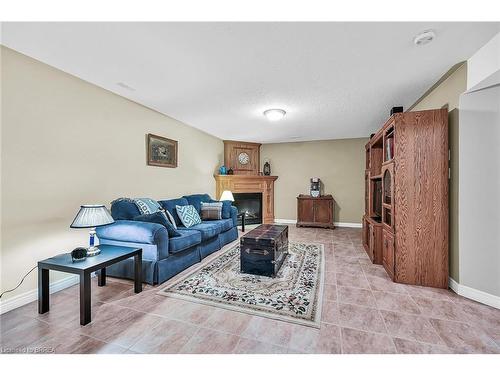 14-633 Park Road N, Brantford, ON - Indoor Photo Showing Living Room With Fireplace