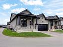 18 Cranberry Crescent, Simcoe, ON  - Outdoor With Deck Patio Veranda With Facade 