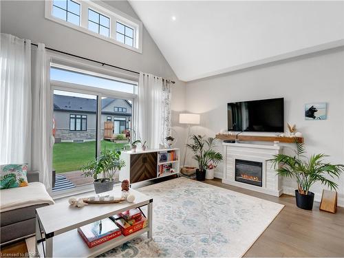 18 Cranberry Crescent, Simcoe, ON - Indoor Photo Showing Living Room With Fireplace