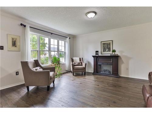 95 Blackburn Drive, Brantford, ON - Indoor Photo Showing Living Room With Fireplace