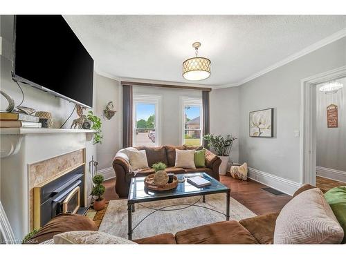 109 St Paul Avenue, Brantford, ON - Indoor Photo Showing Living Room With Fireplace