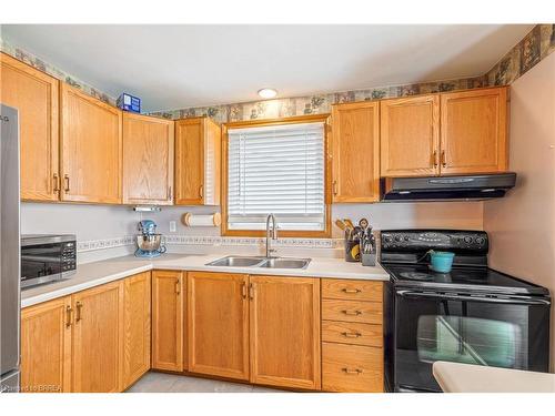 18 Latzer Crescent, Brantford, ON - Indoor Photo Showing Kitchen With Double Sink