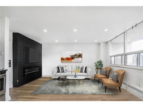 507-15 Albright Road, Hamilton, ON - Indoor Photo Showing Living Room With Fireplace